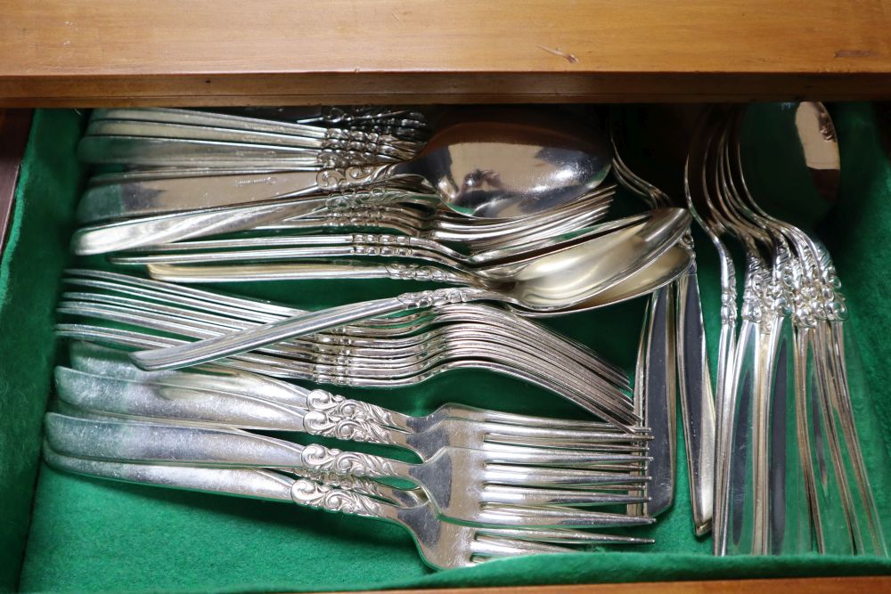 A Community silver plated canteen in three drawer pine chest, 36cm